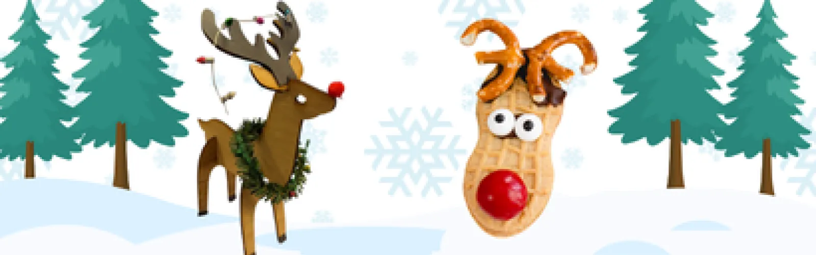 snowy background with a wooden reindeer with holiday decorations and a reindeer made from a peanut butter cookie